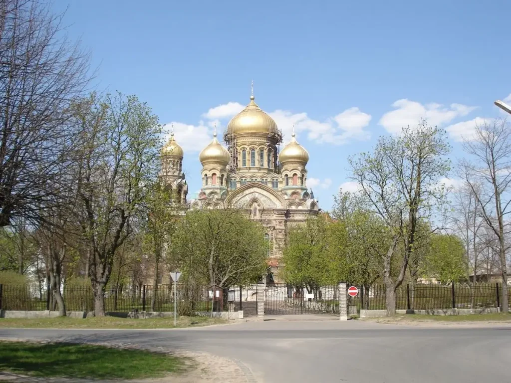 St Nicholas Naval Cathedral in Karosta seen through trees on a clear day