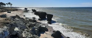 Rocky Karosta coastline in Liepāja with old concrete remains beside the Baltic Sea