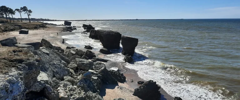 Rocky Karosta coastline in Liepāja with old concrete remains beside the Baltic Sea