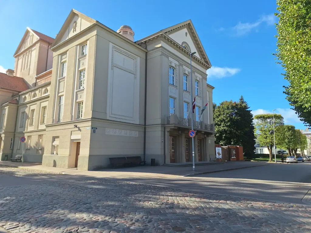 Side wall of Liepāja Theatre beside a cobbled street